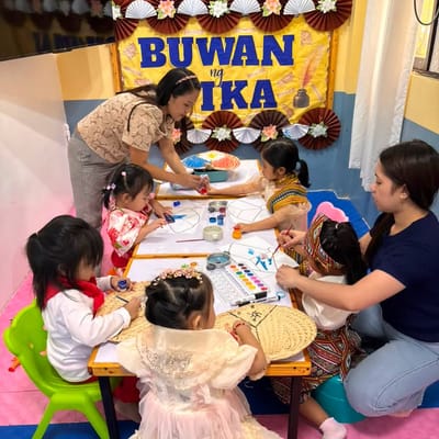 Painting fans for Buwan ng Wika