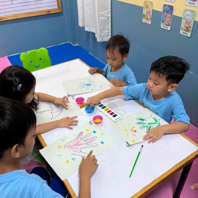 Handprint painting at the table